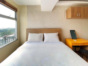Spacious and Unique 1BR at Jarrdin Cihampelas Apartment By Travelio